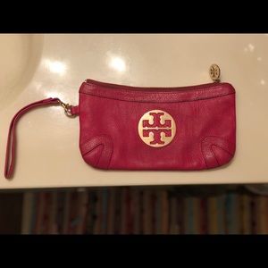 Pink Tory Burch wallet/clutch.